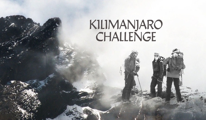 Three disabled men reach the top of Mount Kilimanjaro